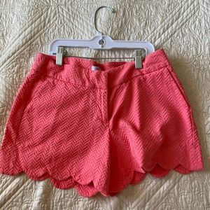 Coral pink scalloped shorts